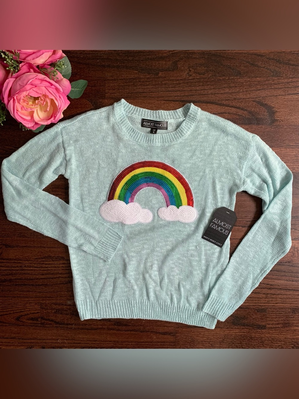 NWT Almost Famous aqua colored sweater with a sequined rainbow, size S